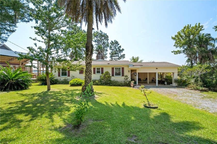 Escape all your worries with this Fowl River getaway at the end - Beach Home for sale in Theodore, Alabama on Beachhouse.com