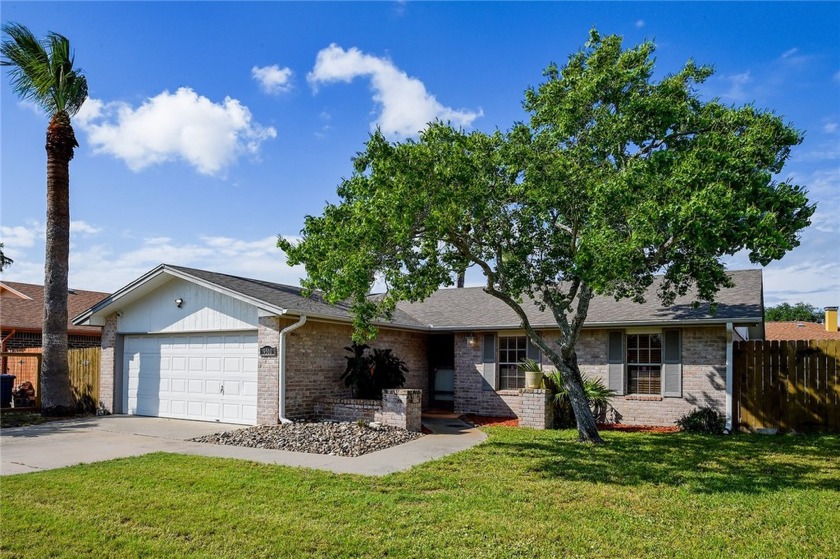 This lovely brick home welcomes you with charm & modern appeal; - Beach Home for sale in Corpus Christi, Texas on Beachhouse.com