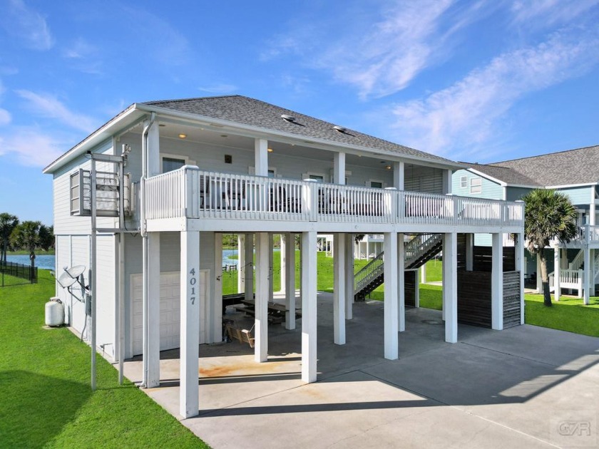 This custom 4-bedroom, 2.5-bathroom home is situated in the - Beach Home for sale in Port Bolivar, Texas on Beachhouse.com