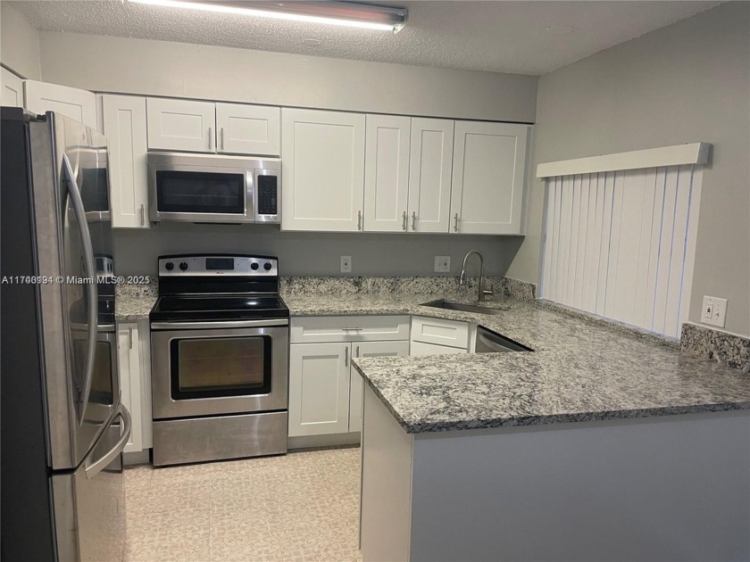 It is on the first floor for the convenience of whoever uses the - Beach Condo for sale in Tamarac, Florida on Beachhouse.com