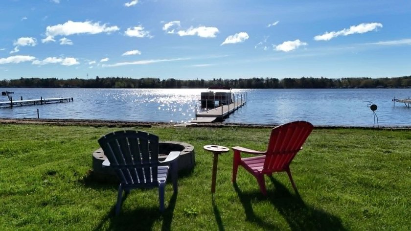 Welcome to your dream lakefront retreat on beautiful Cedar Lake - Beach Home for sale in Greenbush, Michigan on Beachhouse.com