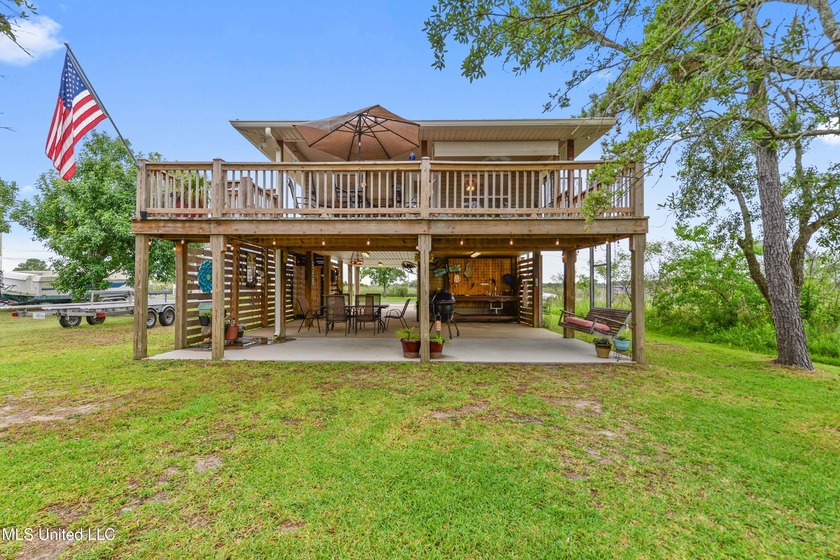 Charming Waterfront Retreat in Shoreline Park - Almost Turnkey! - Beach Home for sale in Bay Saint Louis, Mississippi on Beachhouse.com