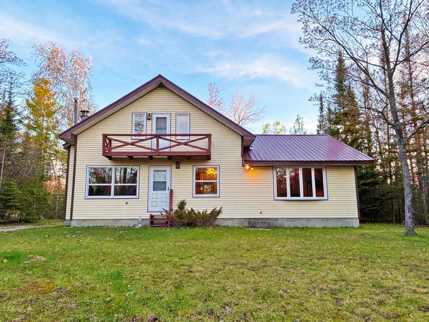 Charming 3 Bed, 2 Bath home located on a private wooded triple - Beach Home for sale in Presque Isle, Michigan on Beachhouse.com