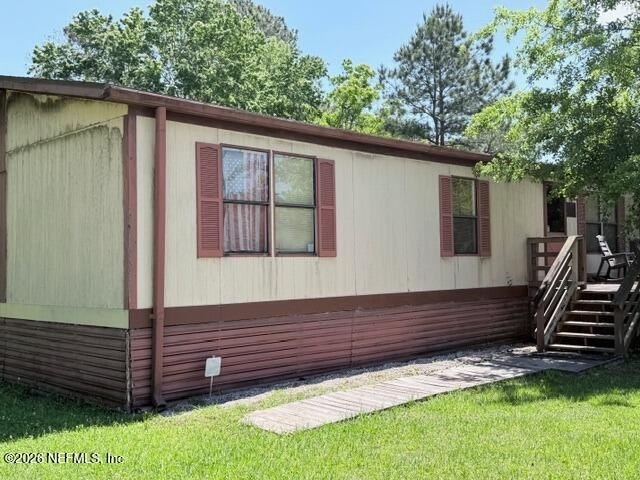 Horton Summit Home is located on 0.45 acres with chain-link - Beach Home for sale in Fernandina Beach, Florida on Beachhouse.com