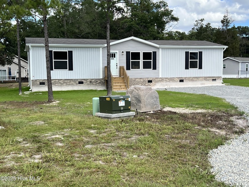 NEWLY MANUFACTURED DOUBLE WIDE HOME with 3 Bedrooms and 2 - Beach Home for sale in Supply, North Carolina on Beachhouse.com