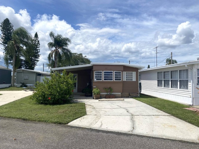 This 2 Bedroom, 1 Bath  Home is in Holiday Travel Park, an All - Beach Home for sale in Holiday, Florida on Beachhouse.com