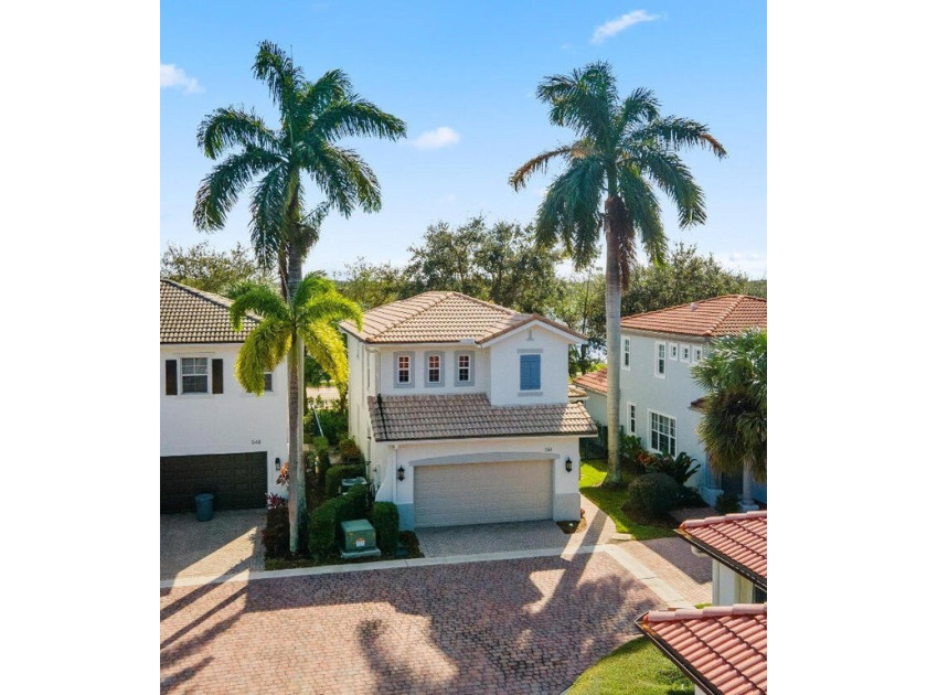 Experience the serene beauty of lake views from this exquisite - Beach Home for sale in Palm Beach Gardens, Florida on Beachhouse.com