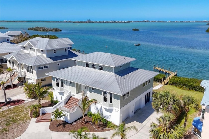 Embrace the Florida waterfront lifestyle in this stunning custom - Beach Home for sale in Englewood, Florida on Beachhouse.com