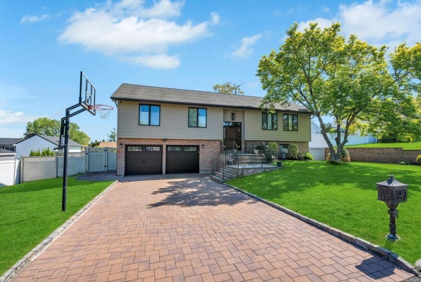 Pristine and Perfect home situated in Strathmore Glen.  This - Beach Home for sale in Glen Cove, New York on Beachhouse.com