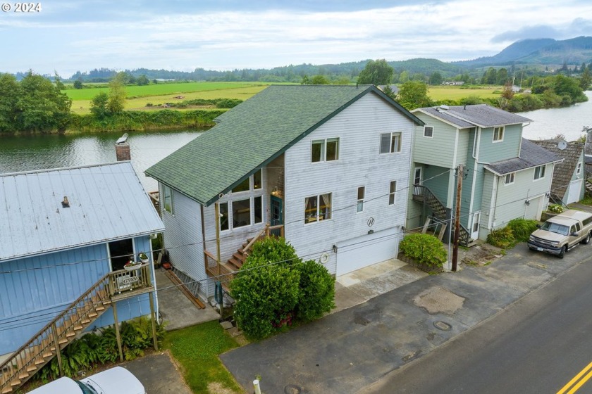 Discover your dream home nestled along the Nehalem River. This - Beach Home for sale in Nehalem, Oregon on Beachhouse.com