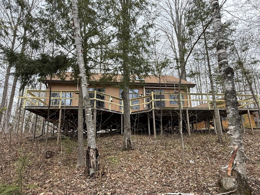 Enjoy waterfront living on beautiful Twin Lakes in Cheboygan - Beach Home for sale in Cheboygan, Michigan on Beachhouse.com