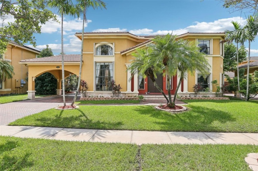 Welcome to this exceptional residence where luxury meets - Beach Home for sale in Miramar, Florida on Beachhouse.com