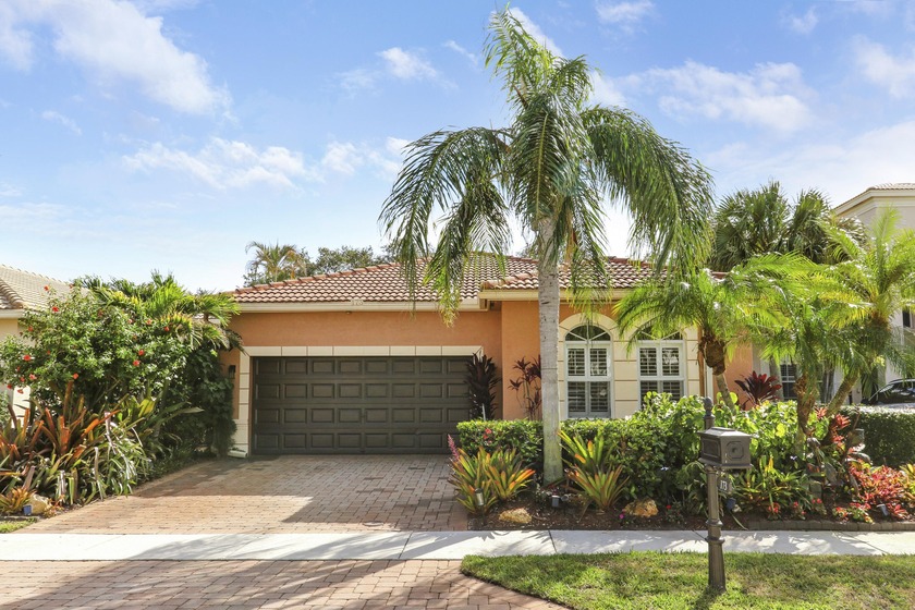 Welcome to this 4-bedroom, 2.5-bath home located in the - Beach Home for sale in Palm Beach Gardens, Florida on Beachhouse.com