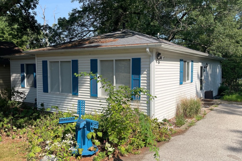 Exceptional updated ranch with views of White Lake. This one is - Beach Home for sale in Montague, Michigan on Beachhouse.com
