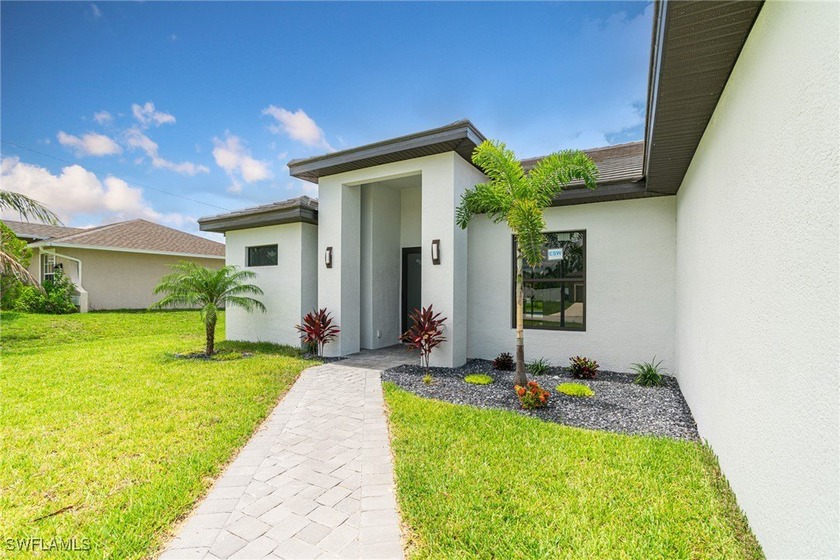 Here is a POOL NEW CONSTRUCTION HOUSE WITH TILE ROOF ON A CORNER - Beach Home for sale in Cape Coral, Florida on Beachhouse.com