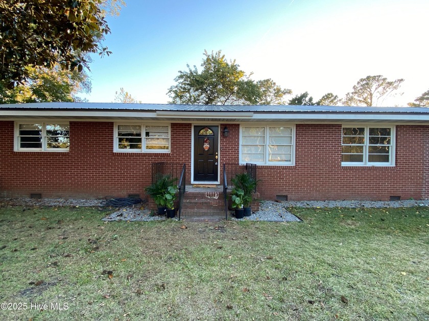 This timeless brick ranch, priced under $400K, offers 4 bedrooms - Beach Home for sale in Wilmington, North Carolina on Beachhouse.com
