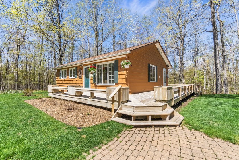 Tucked away in the highly sought-after Cordwood Point community - Beach Home for sale in Cheboygan, Michigan on Beachhouse.com