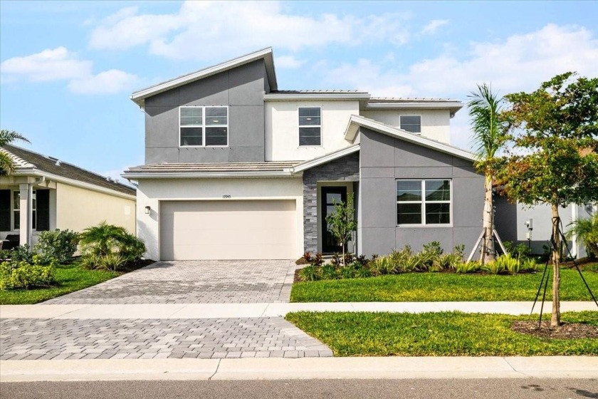 BETTER THAN NEW with PREMIUM UPGRADES in SUNSTONE at WELLEN - Beach Home for sale in Venice, Florida on Beachhouse.com