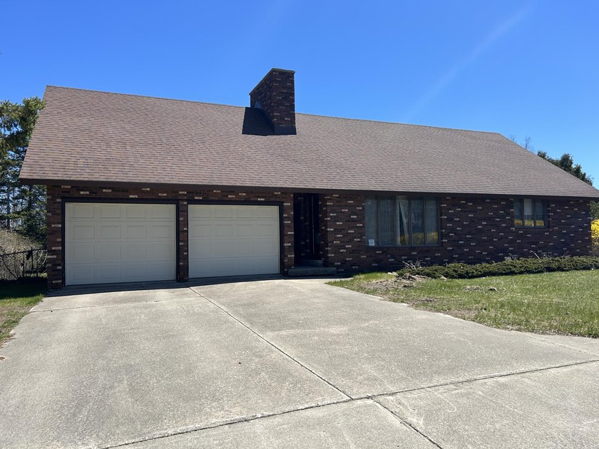 Located in a highly desirable subdivision, this custom 4-bedroom - Beach Home for sale in Alpena, Michigan on Beachhouse.com