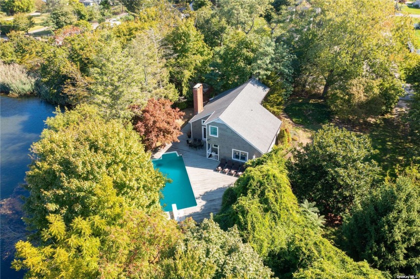 Hidden gem, this home is tucked away and private, yet close to - Beach Home for sale in Riverhead, New York on Beachhouse.com