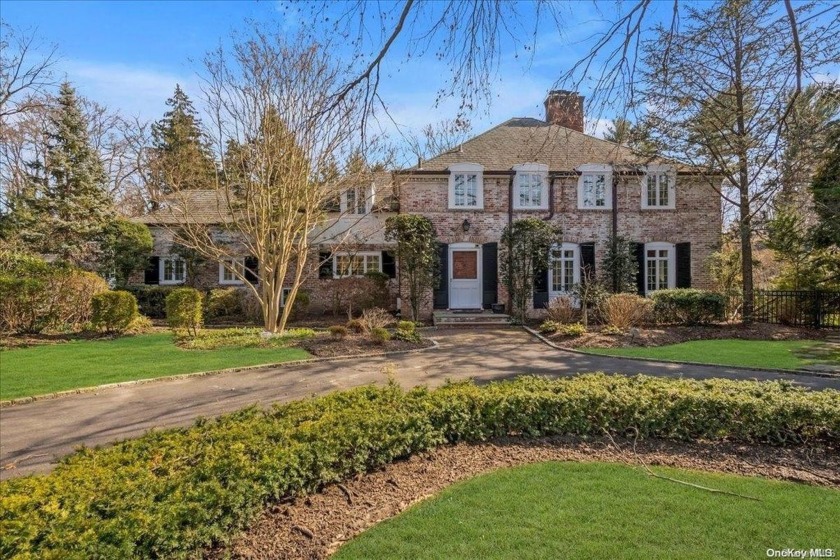 Marked by an elegant and impressive approach, this stately Sands - Beach Home for sale in Sands Point, New York on Beachhouse.com