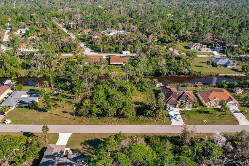 Discover the perfect canvas for your dream home! This waterfront - Beach Lot for sale in Port Charlotte, Florida on Beachhouse.com