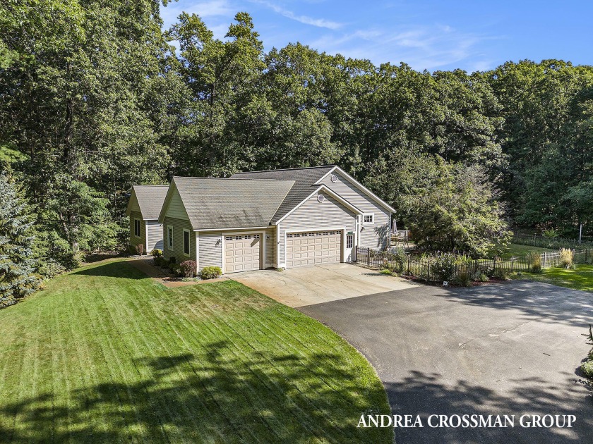 This Lakeshore area ranch home includes a 3-4 stall garage on 1 - Beach Home for sale in West Olive, Michigan on Beachhouse.com