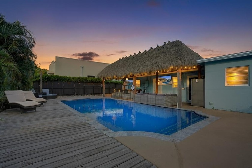 Discover your private tropical retreat in this 3 Bedroom, 2 - Beach Home for sale in Oakland Park, Florida on Beachhouse.com