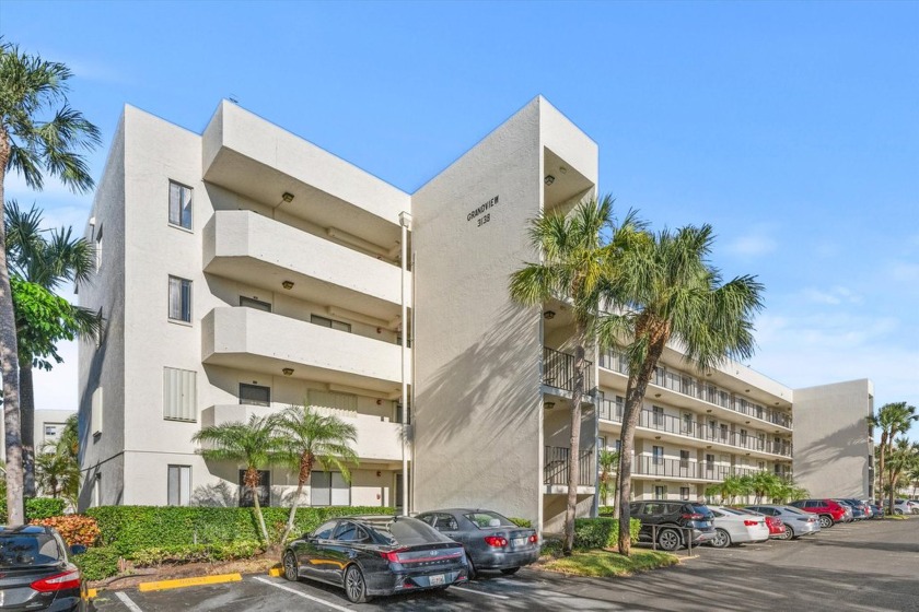 &#127969; First-Floor Beauty with Stunning View!Discover this - Beach Condo for sale in Lake Worth, Florida on Beachhouse.com