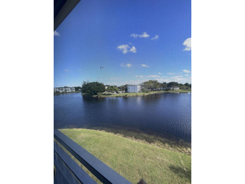 BEAUTIFUL ,FURNISHED, 2/1.5, PENTHOUSE CONDO with GORGEOUS  LAKE - Beach Condo for sale in Deerfield Beach, Florida on Beachhouse.com