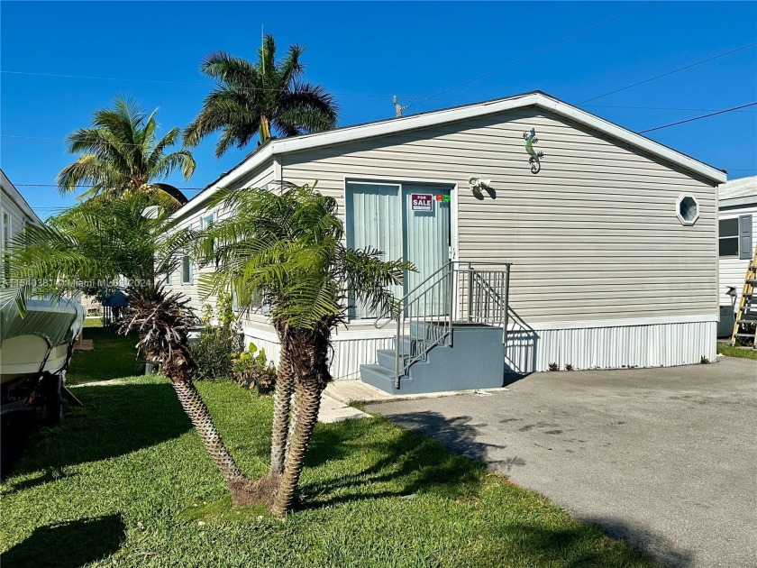 Super Spacious DOUBLE-WIDE manufactured home in the gated - Beach Home for sale in Homestead, Florida on Beachhouse.com
