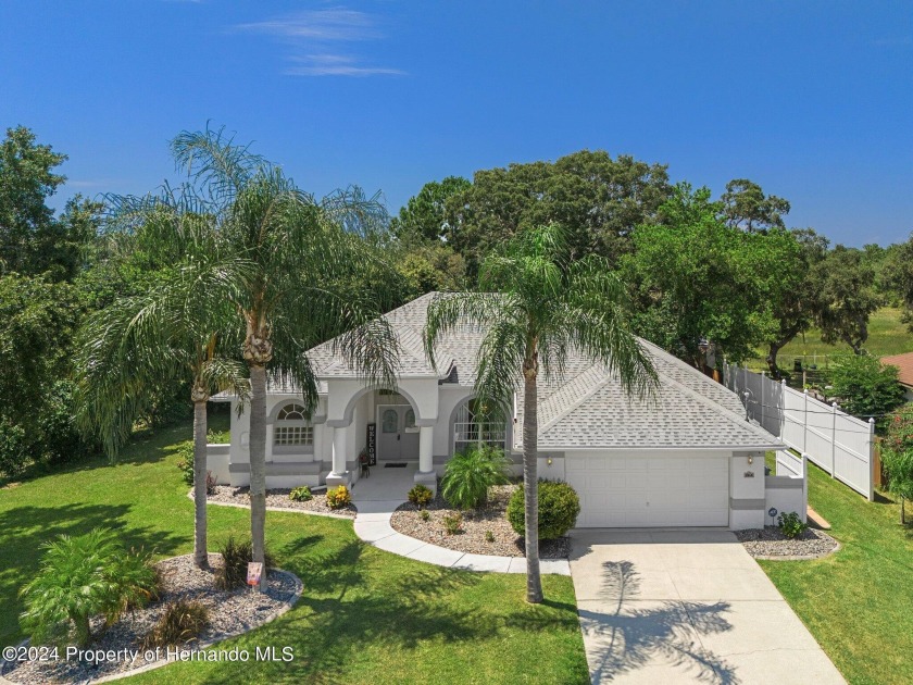 This custom-built, meticulously cared-for home is a true Florida - Beach Home for sale in Spring Hill, Florida on Beachhouse.com