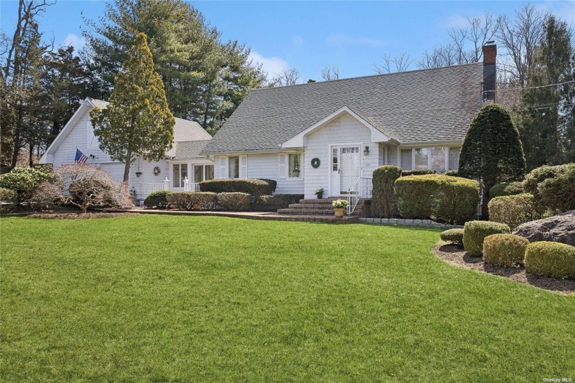 Located in the peaceful hamlet of Strong's Neck, this charming - Beach Home for sale in Setauket, New York on Beachhouse.com