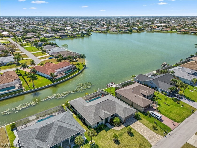 ENJOY SUNRISES OVER SEA BREEZE LAKE. ASSESSMENTS ARE PAID on - Beach Home for sale in Cape Coral, Florida on Beachhouse.com