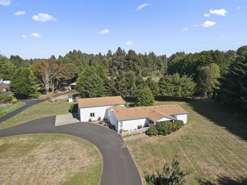 This spacious manufactured home sits on a full acre, offering - Beach Home for sale in Crescent City, California on Beachhouse.com