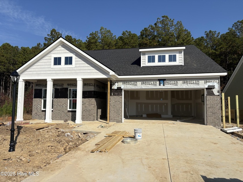 Discover the Litchfield plan in Brunswick Plantation's premier - Beach Home for sale in Calabash, North Carolina on Beachhouse.com