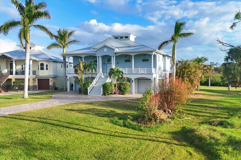 Motivated Seller! A Luxury Statement of Waterfront Living! POOL - Beach Home for sale in Englewood, Florida on Beachhouse.com