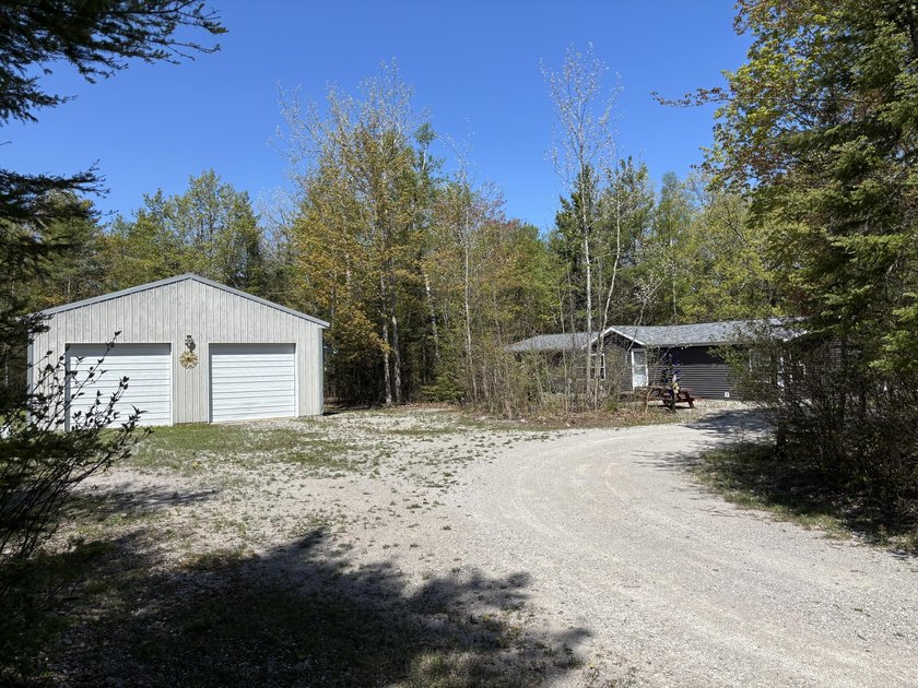 Tucked between Grand Lake & Lake Huron sits this spacious 3 - Beach Home for sale in Presque Isle, Michigan on Beachhouse.com