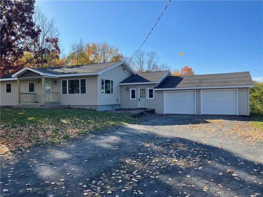 THIS RANCH HOME JUST UNDERWENT A WHOLE HOUSE RENO! NESTLED - Beach Home for sale in Sandy Creek, New York on Beachhouse.com