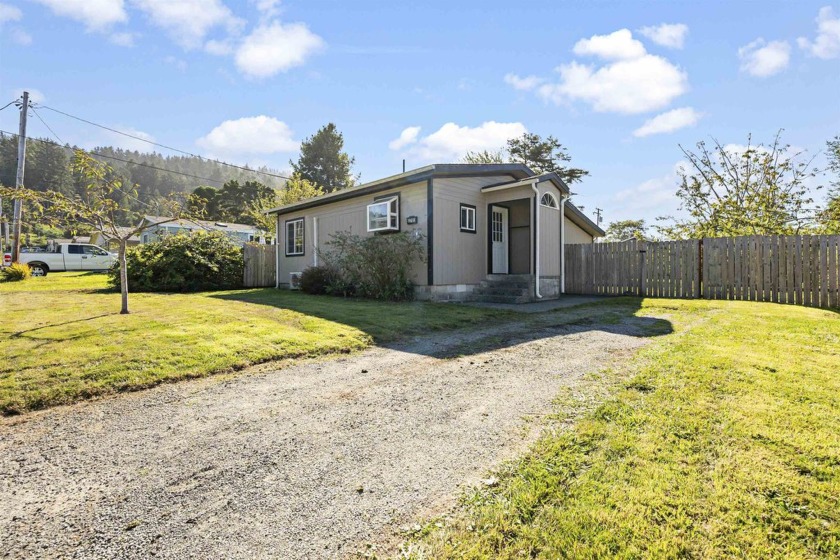 Step into coastal living with this charming 2-bedroom, 1-bath - Beach Home for sale in Crescent City, California on Beachhouse.com