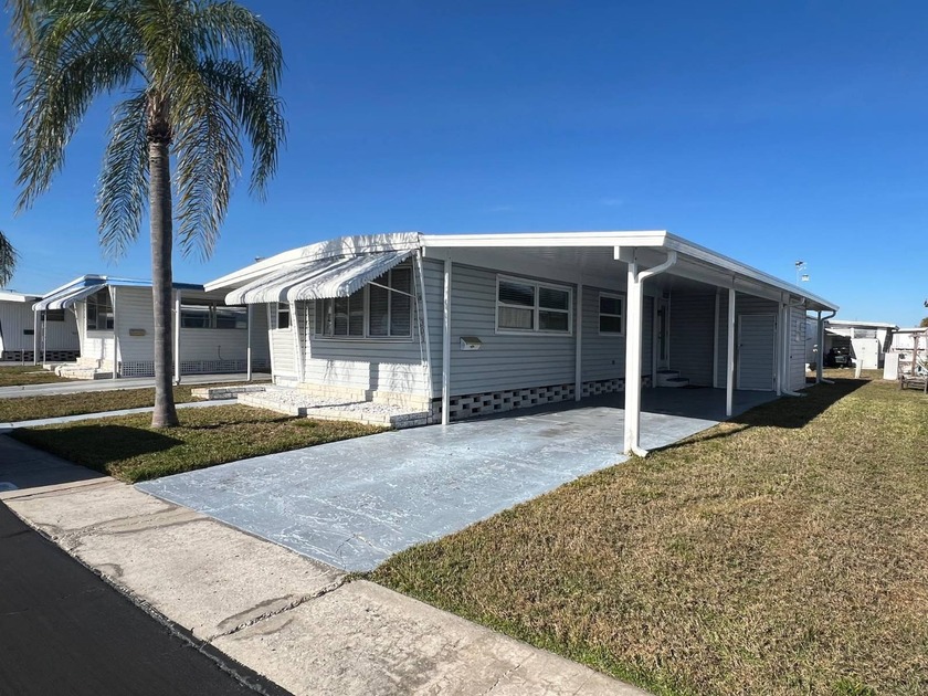 Experience relaxed Florida living at Four Seasons Estates, a - Beach Home for sale in Largo, Florida on Beachhouse.com