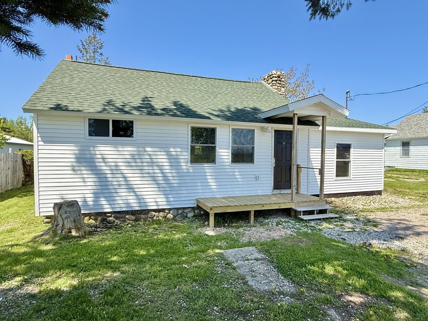 Great opportunity to complete this in-town home and make it - Beach Home for sale in Cheboygan, Michigan on Beachhouse.com