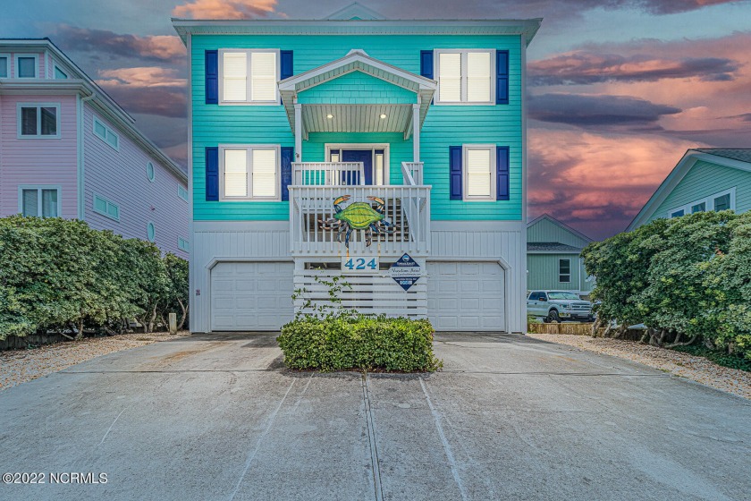 Location is everything.  This stunning OCEANFRONT home is - Beach Home for sale in Surf City, North Carolina on Beachhouse.com