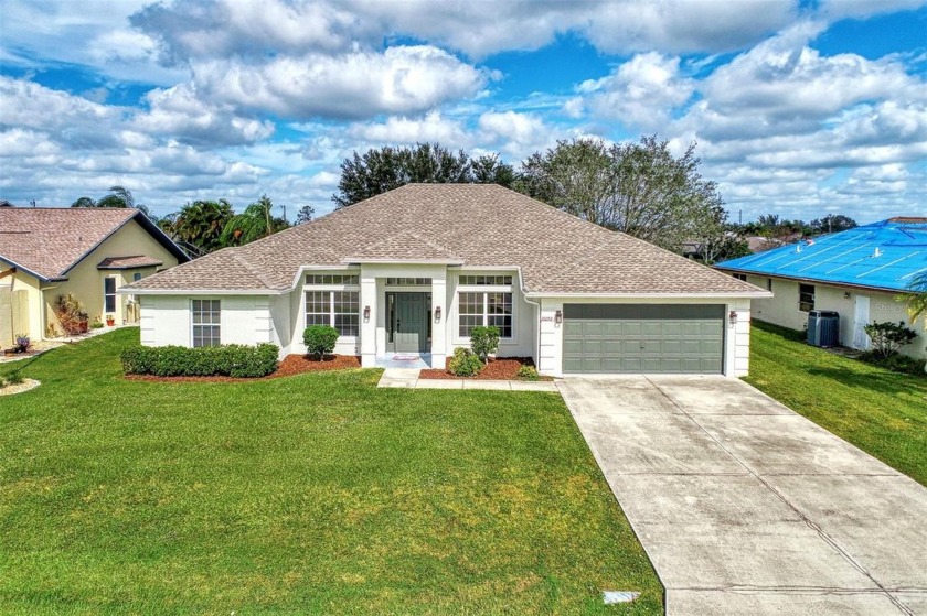 Ready for a quick closing! Stunning 4-bedroom home located on a - Beach Home for sale in Punta Gorda, Florida on Beachhouse.com