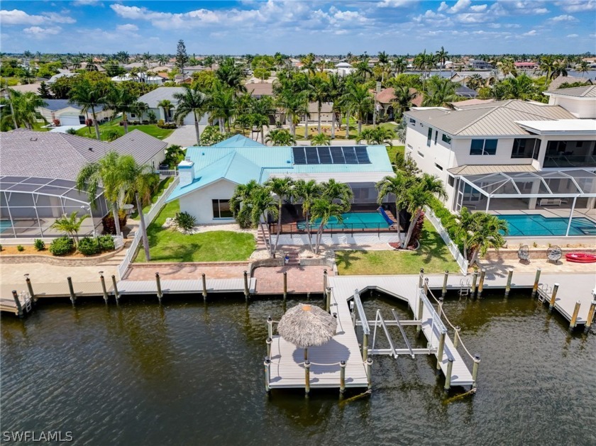 Welcome to your waterfront Gulf access paradise! LOCATION - Beach Home for sale in Cape Coral, Florida on Beachhouse.com