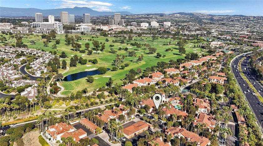 Discover luxurious single-level living in this well appointed 2 - Beach Condo for sale in Newport Beach, California on Beachhouse.com