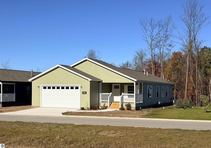 This move-in-ready home is located close to the community - Beach Home for sale in Traverse City, Michigan on Beachhouse.com