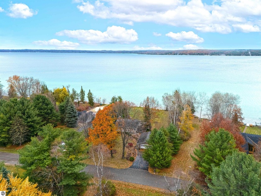 Elk Lake home with 117' of Private Frontage in coveted - Beach Home for sale in Elk Rapids, Michigan on Beachhouse.com