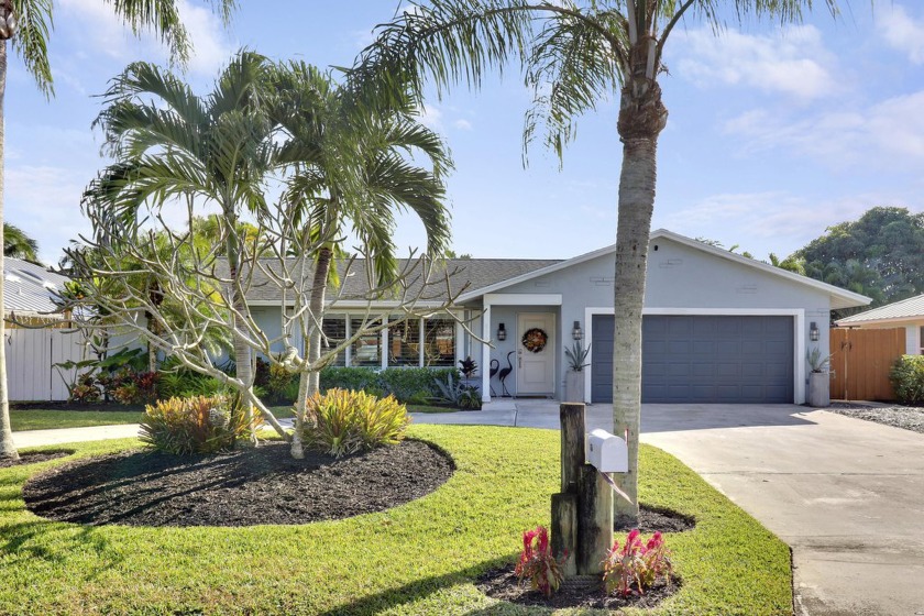 Newly offered pool home in the highly sought after non HOA - Beach Home for sale in Palm Beach Gardens, Florida on Beachhouse.com