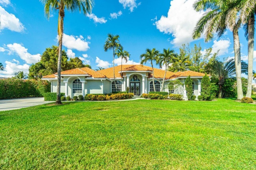 FULLY RENOVATED - POOL HOME - LAKE FRONT - 2019 ROOF - 1.33 ACRE - Beach Home for sale in Lake Worth, Florida on Beachhouse.com